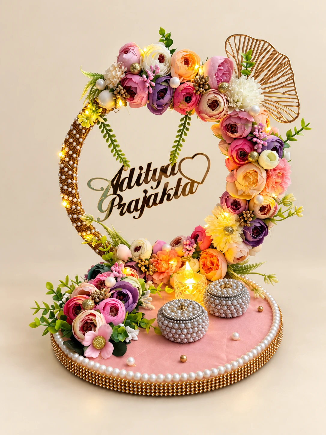 Pink ring platter with a floral hoop, fairy lights and a personalised name sign