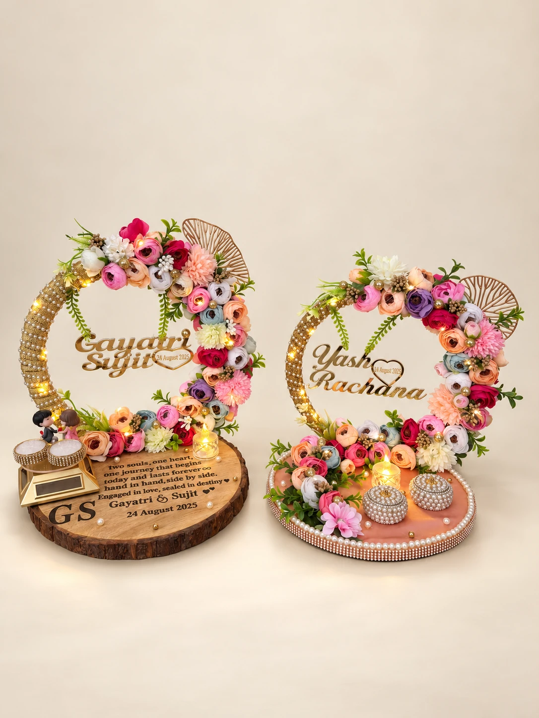 Two ring platters, one on a wooden slab and one in pink, each with a floral hoop and name sign