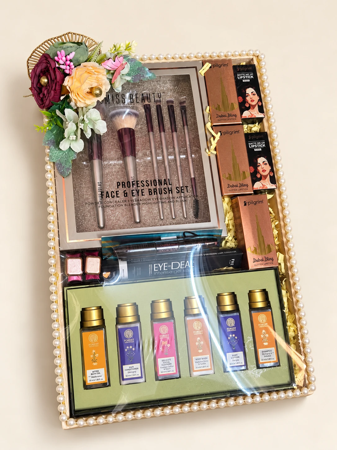 Pearl-edged tray with a brush set, cosmetics and bath products